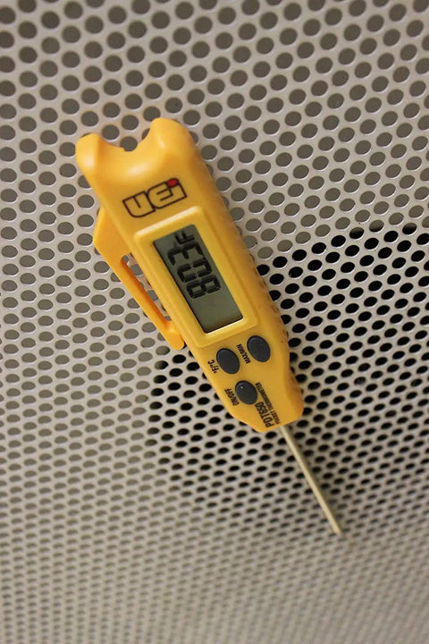 Pocket Digital Thermometer With Folding Probe Magnetic Mount And Large Display For HVAC And Field Work Yellow Rugged And Accurate Extended Temperature Range Go To Tool clipped to perforated metal vent