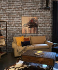 Living room with Vintage Brown Brick Peel And Stick Wallpaper Removable Faux 3D Brick For Walls And Fireplace Easy Install No Glue Required Self Adhesive PVC Eco Friendly Repositionable 17.7 Inch By 197 Inch Roll 24.27 Sq Ft. covering the walls, sofa, and artwork.