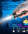Hand holding Beast Bright 2200 Lumens Dive Light with 8 Degree Narrow Beam, underwater scene, USB C rechargeable, IP68 waterproof