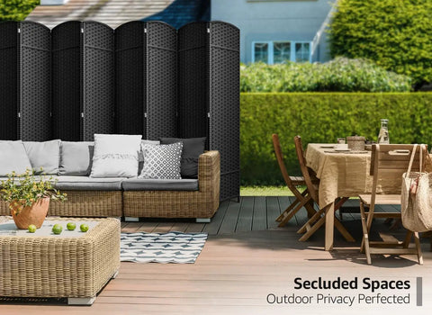 8 Panel Black Room Divider With Double Hinged Panels, 6 Ft Tall Folding Privacy Screen creating a secluded outdoor space