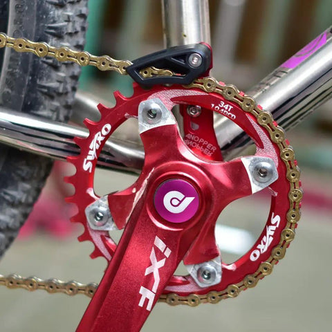 Close-up of chain guide for 30-40T narrow wide chainring direct mount guard ISCG 03 aluminum bike accessory on crankset.
