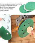 Hand applying 50Pcs 6 Inch 6 Hole Wet Dry Sanding Discs Assortment Set Green Film Back Grit 60 120 150 240 400 600 800 1000 1500 2000 For Metal Car Boat Polishing And Finishing Pro Grade to sander on wood surface