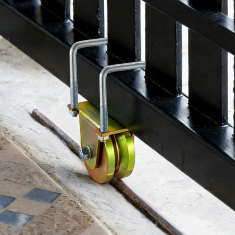 Smooth Operator 4 Inch Crowned V Groove Sliding Gate Rollers Double Bearing Wheels with U Bracket installed on gate.