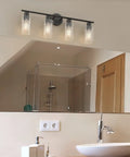 Matte Black 4 Light Vanity Light Over Mirror Dope Modern Sconce With UL Certified E26 Base shown above bathroom mirror