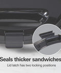 Hamilton Beach Electric Sealed Sandwich Maker Grill For Hot Pockets And Grilled Cheese showing lid latch with two locking positions.
