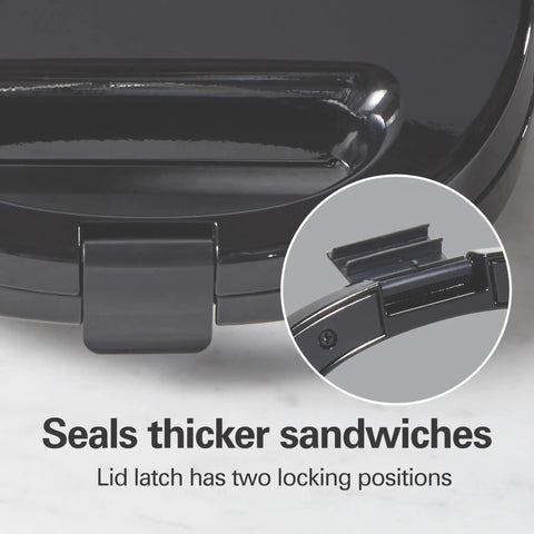 Hamilton Beach Electric Sealed Sandwich Maker Grill For Hot Pockets And Grilled Cheese showing lid latch with two locking positions.
