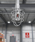 Rock Solid Heavy Duty Fire Sprinkler Head Guard Sturdy Iron Metal Shield Cover For Ceiling Pipe Setup Durable Cage Protector Built Tough As Nails For Commercial Facilities Knockout Protection mounted on a ceiling pipe.