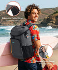 Man at beach carrying Cooler Backpack For 28 Cans Insulated Leak Proof Lightweight Grab And Go Cooler with breathable straps