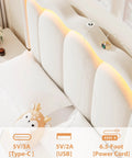 Close-up of adjustable wavy headboard LED lights and built-in charging ports on Full Size Beige Velvet Platform Bed Frame With Soft Led Lighting And Dual Gliding Storage Drawers Plus Adjustable Wavy Headboard Built In Charging Ports And Sturdy Wood Slats For Legit Comfy Sleep Zero Box Spring Hassle.