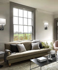Set of 2 Wall Sconces With USB Port And AC Outlet, Nickel Finish Bedside Lamps in living room setting