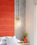 Three Pack Modern Mini Pendant Lights In Brushed Brass With Clear Stripe Glass Shade hanging in a bedroom setting