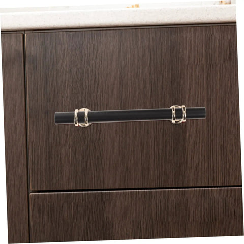 Aluminum Alloy Drawer Handles And Cabinet Pulls Kit in black finish on a wooden dresser drawer