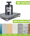 Rock Solid Built Tough Leveling Caster Wheels Set Of 4 Featuring 2200 Lbs Load Capacity with heavy load displayed on flat surface.