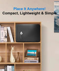 Compact Mini Safe Box For Home And Dorms With Key Lock on a wooden shelf, durable black design, 0.23 cubic feet