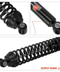 Close-up of Rear Towing Shocks Absorbers With Coil Spring Load Adjustable System for Trucks, heavy-duty design.