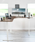 Vivo Electric L Shaped Corner Standing Desk With Memory Height Adjustment And White Finish For Office Ergonomic Sit Stand Workstation Dual Motor Lift System Smooth Operation Spacious Workspace, modern setup with dual monitors.