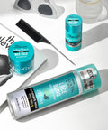 Lace Bond Adhesive Spray with Ultimate Hold for Lace Frontals, sweat proof, water resistant, lying next to comb on table.