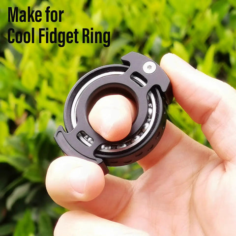 Hand holding Aluminum Alloy Fidget Ring For Men Dope Anxiety Relief Toy With 6804 Ball Bearing Chain Bike Sound Nuclear Reactor Design