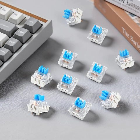 Blue 3-Pin Mechanical Keyboard Switches 200 Pack With Dustproof Housing, Clicky Tactile Feel, 50 Million Click Life, Replacement Keys For Gaming Keyboards, Ideal For 3D Printing Projects And Fidget Builds on a keyboard