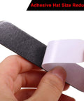 Close-up of Multi Size Foam Hat Size Reducer Tape Inserts With Self Adhesive shown in hand for custom fit