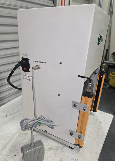 Workhorse Benchtop Pneumatic Press With Foot Pedal For Hands Free Operation, Dual Safety Light Curtains, And Adjustable Dwell Timer For Blister Packaging, Stamping, Riveting, And Component Assembly, side view with foot switch