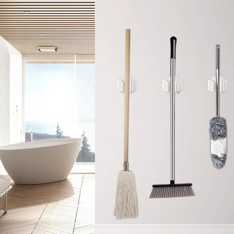 6 Pack Broom And Mop Holder Wall Mounts In Stainless Steel Holds Up To 2.5 Kg With Included Screws in white bathroom setting.