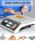 Person using 10Kg Digital Counting Scale With 0.1g Precision For Inventory And Parts, RS232 Port To Computer Or Printer, showing versatility.