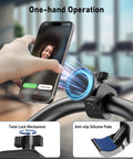 Hand using Ultra Strong Magnetic Phone Holder Clamp Mount on handlebar, showing twist lock and anti-slip pads, for MagSafe iPhone.