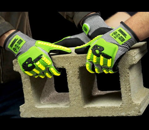 TRX T Rex ANSI A5 Lightweight HPPE Shell Impact Gloves With Sandy Nitrile Palm Coating For A Grippy Wet Grip And Solid Cut Protection, 1 Pair, Size 10 XL, Model TRX441 shown lifting a cinder block