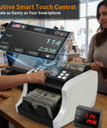 Person using Mixed Denomination Money Counter Machine For Small Biz And Retail with display on office cash desk.