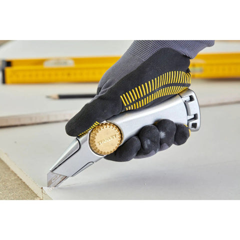 Titan 1-10-550 Fixed Blade Utility Knife With Safe Locking Nose for Precise Cutting in gloved hand, silver handle
