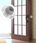 Beefy Heavy Duty Wall Door Stoppers 3 Pack Stainless Steel With Silver Rubber Cushion installed on wall near door