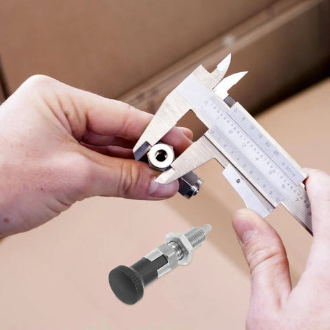 Measuring a Stainless Steel Retractable Spring Plunger Knurled Grip Indexing Pin with calipers for precision fit.