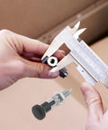 Stainless Steel Spring Plunger Pin With Knurled Handle being measured with calipers for precision in metalworking projects.