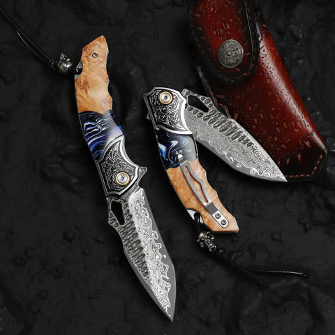 Damascus Steel Folding Knife With Resin Fusion Maple Wood Handle 8 Inch EDC Pocket Knife with sheath and clip on black surface