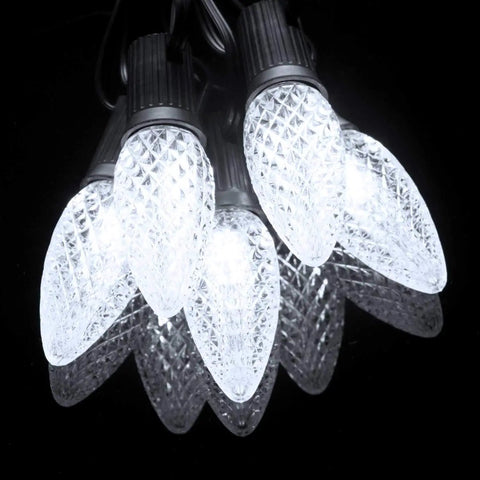 100 Pack Pure White C9 LED Christmas Light Bulbs, Dimmable And Shatterproof, E17 Base, close-up with bright two LEDs per bulb.