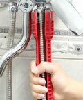 14 In 1 Tap Spanner Tool for Faucet Installation And Plumbing Repair, red handle, being used on bathroom faucet
