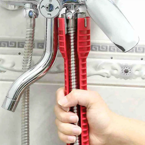 14 In 1 Tap Spanner Tool for Faucet Installation And Plumbing Repair, red handle, being used on bathroom faucet