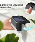 Real Deal Solar Deck Lights For Outdoor Yard And Fence Featuring Waterproof 16 Pack showing a hand adjusting the light switch.