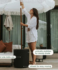 Durable Outdoor Umbrella Side Table with Umbrella Hole for Patio shown with patio setup and umbrella stabilizer feature