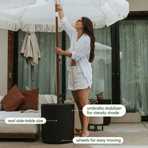 Durable Outdoor Umbrella Side Table with Umbrella Hole for Patio shown with patio setup and umbrella stabilizer feature