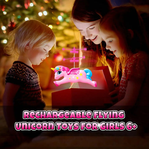 Children enjoying Magical Flying Unicorn Toy For Girls With LED Lights Fairy Flying Ball Helicopter Drone glowing indoors.