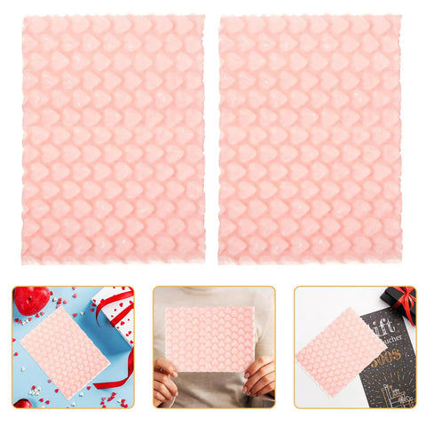 Pink heart shaped bubble mailers pack for jewelry and delicate items with shockproof plastic bags in various settings