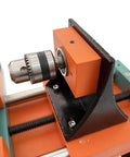 Close-up of chuck on Techtongda Mini Wood Lathe With Dual Motors For Turning And Drilling Soft Metals Plastic Plexiglass Compact Buddha Bead Machine.