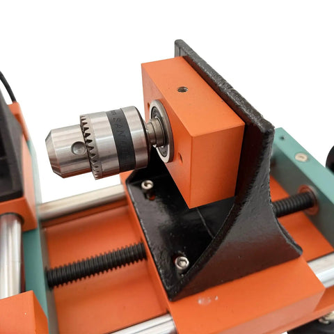Close-up of chuck on Techtongda Mini Wood Lathe With Dual Motors For Turning And Drilling Soft Metals Plastic Plexiglass Compact Buddha Bead Machine.