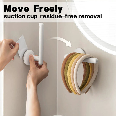Suction Cup Headband Holder And Wall Mounted Hair Accessory Organizer Keeps Your Bathroom Vanity Looking Fly With This Hassle Free No Drill Scrunchie Storage Rack In Crisp White on a smooth wall with hair ties.