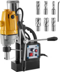 Powerful 40Mm Magnetic Drill Press With 1100W Motor showing drill head, control panel, and drill bits for precision metal work.