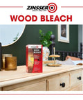 Game Changing Two Step Wood Bleach Kit For Interior Wood on a wooden dresser, surrounded by decor, ready for use.