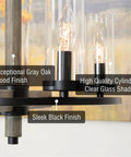Close-up of Alden 18 Inch 4 Light Modern Farmhouse Chandelier with gray oak wood finish, black accents, and clear cylinder glass shades.