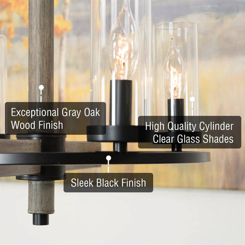 Close-up of Alden 18 Inch 4 Light Modern Farmhouse Chandelier with gray oak wood finish, black accents, and clear cylinder glass shades.